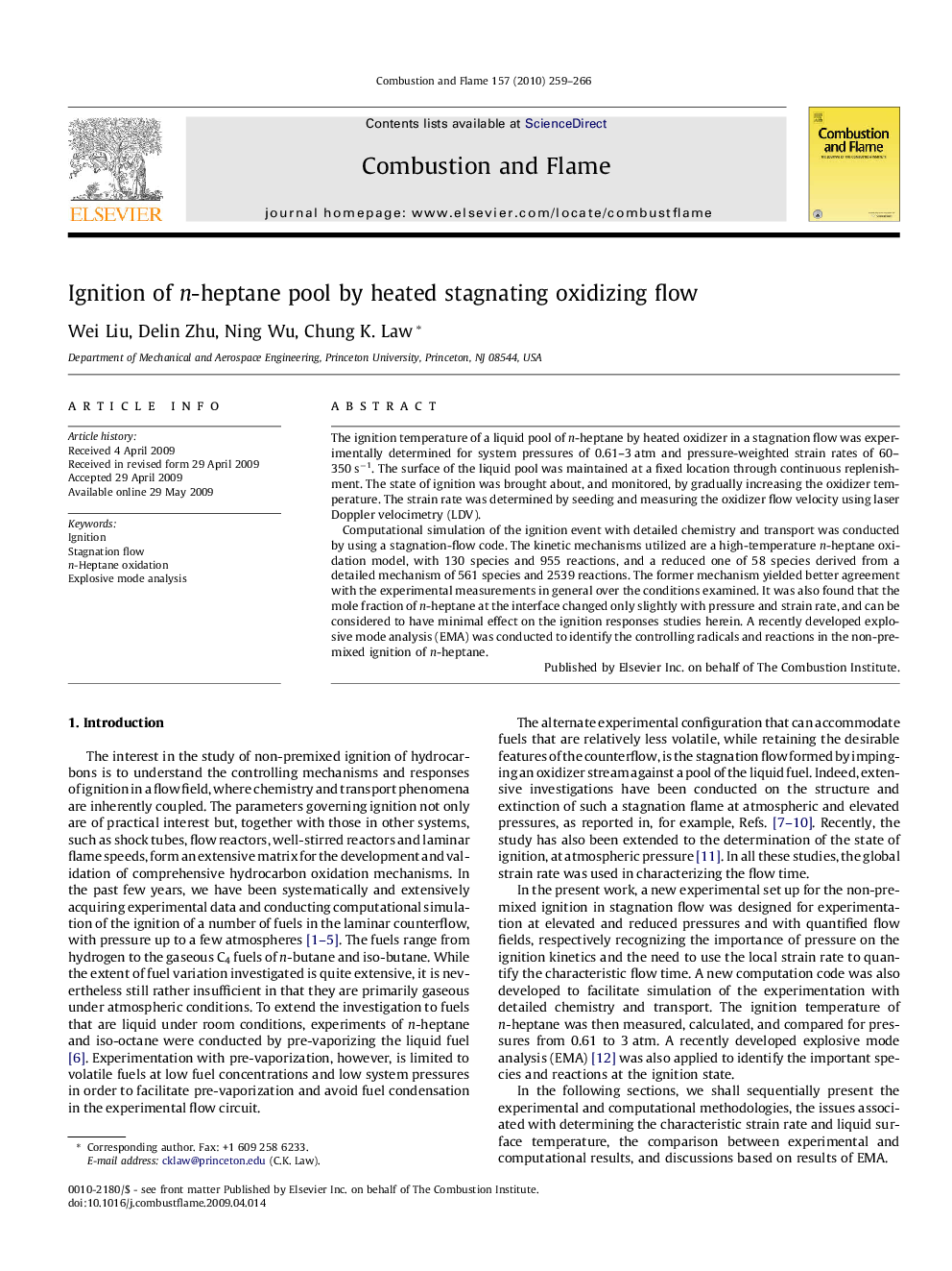 Ignition of n-heptane pool by heated stagnating oxidizing flow