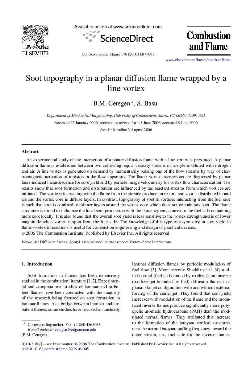 Soot topography in a planar diffusion flame wrapped by a line vortex