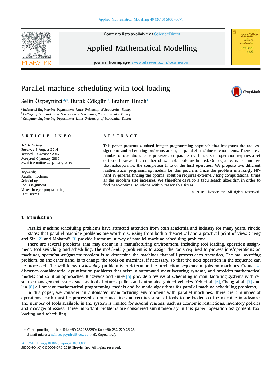 Parallel machine scheduling with tool loading