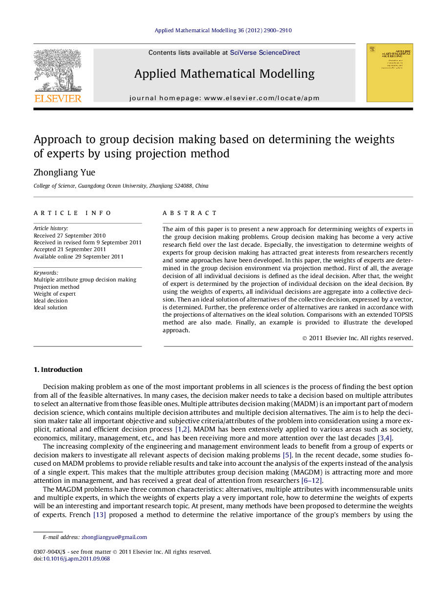 Approach to group decision making based on determining the weights of experts by using projection method