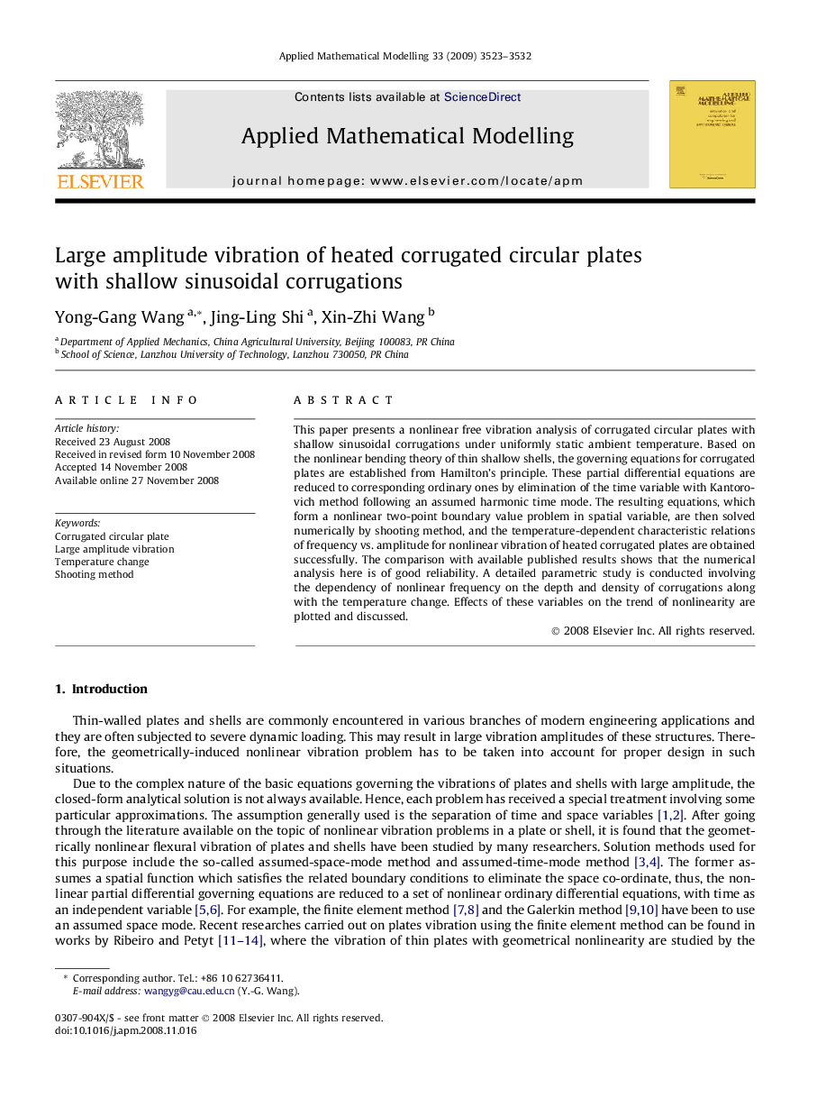 Large amplitude vibration of heated corrugated circular plates with shallow sinusoidal corrugations