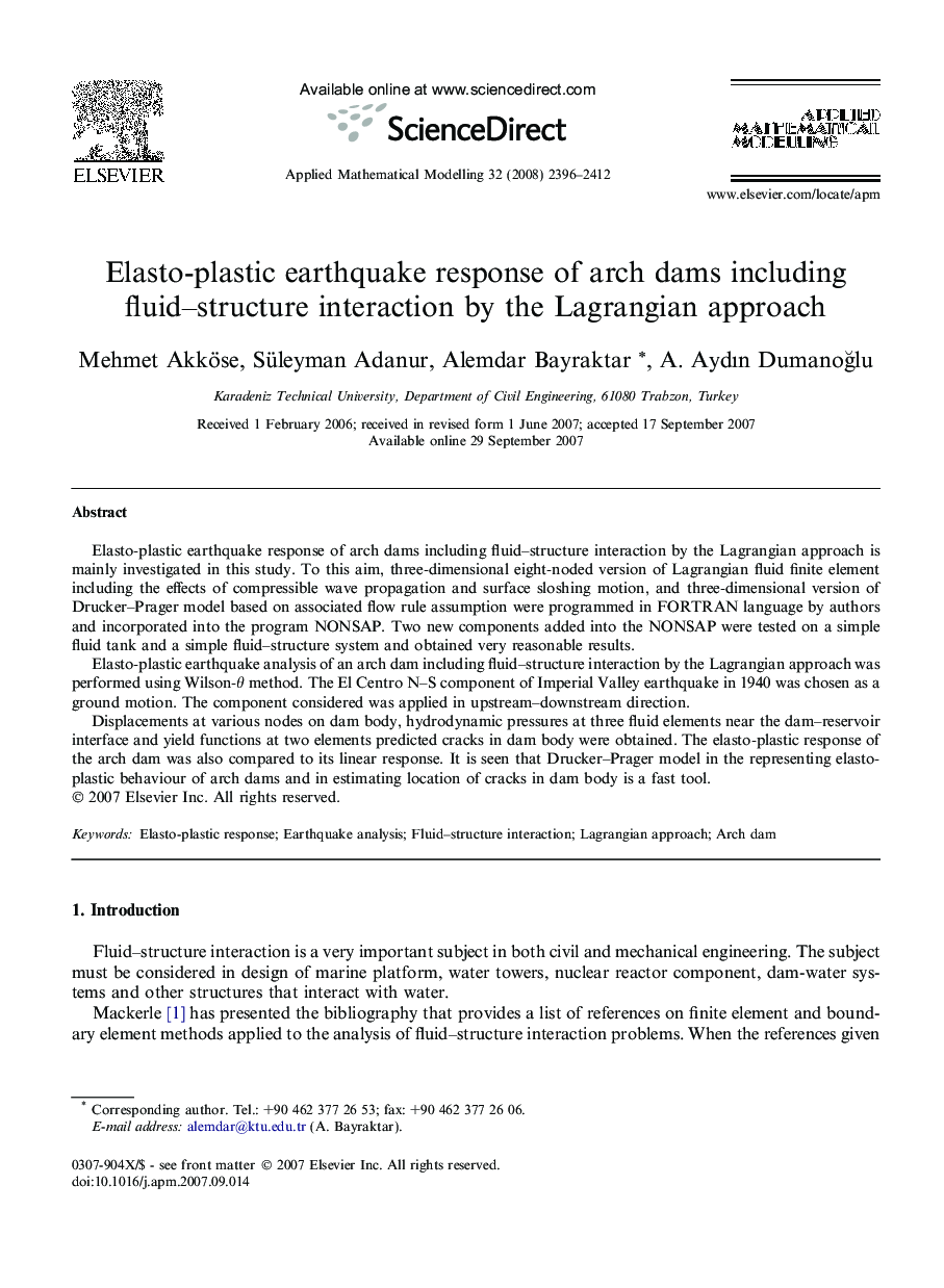 Elasto-plastic earthquake response of arch dams including fluid–structure interaction by the Lagrangian approach