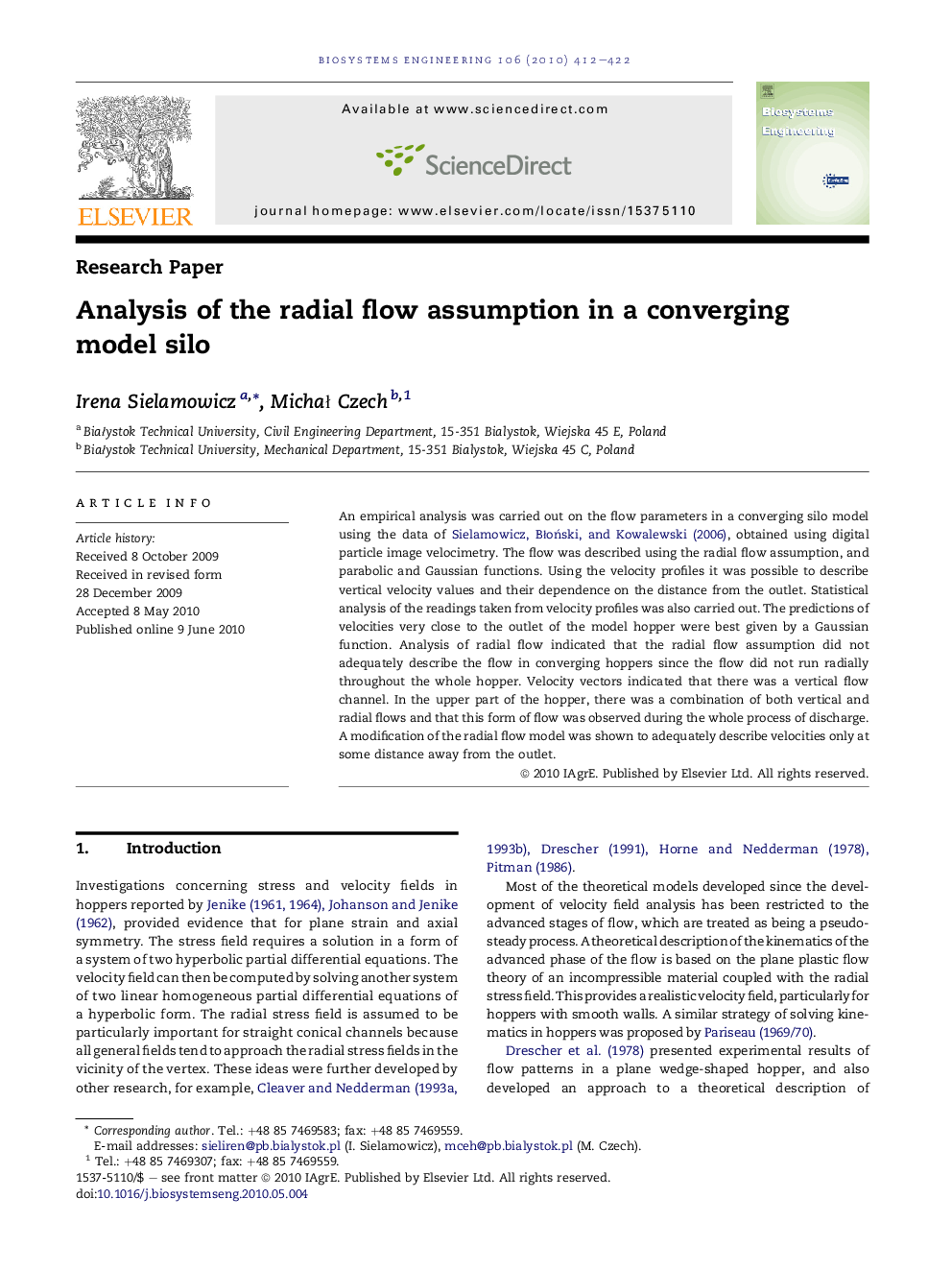 Analysis of the radial flow assumption in a converging model silo