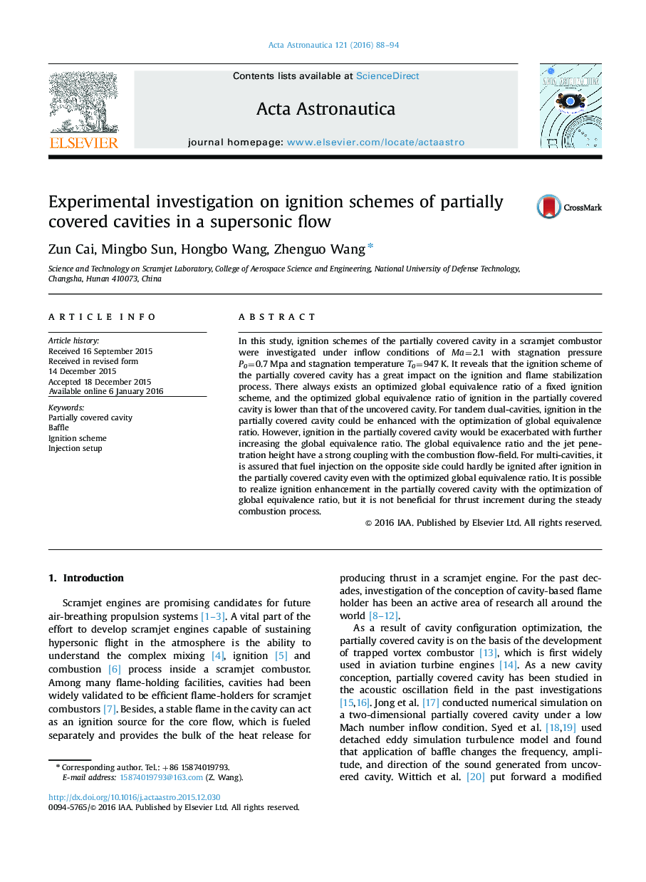 Experimental investigation on ignition schemes of partially covered cavities in a supersonic flow