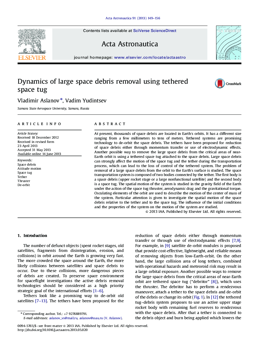 Dynamics of large space debris removal using tethered space tug