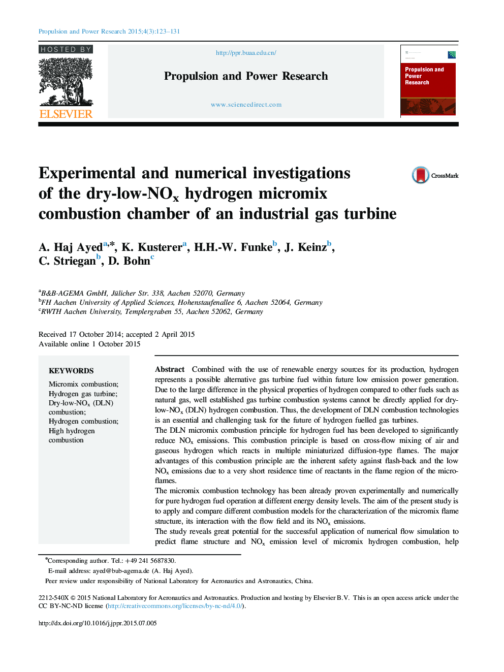 Experimental and numerical investigations of the dry-low-NOx hydrogen micromix combustion chamber of an industrial gas turbine 