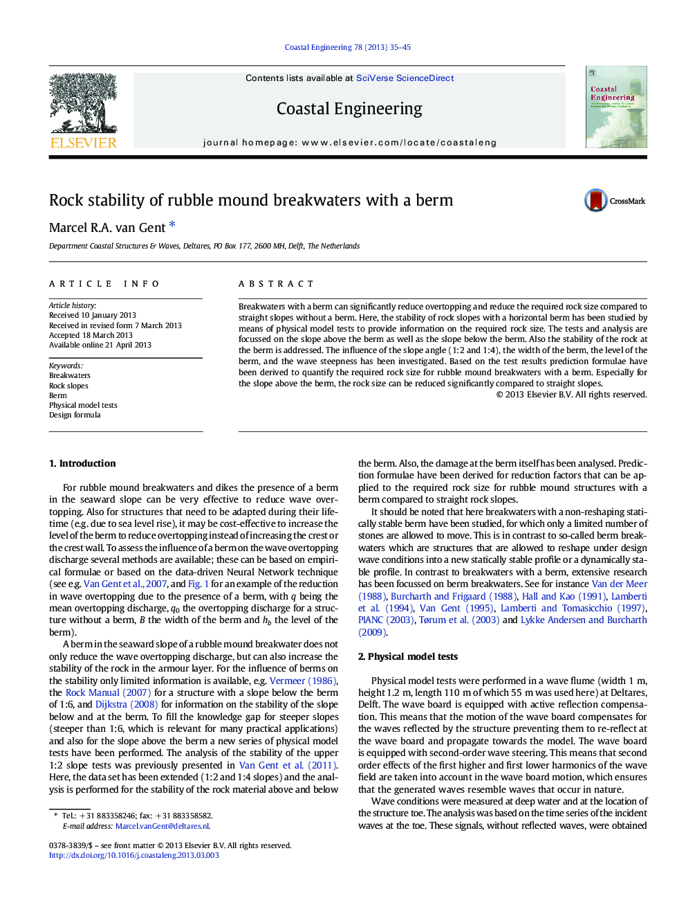 Rock stability of rubble mound breakwaters with a berm