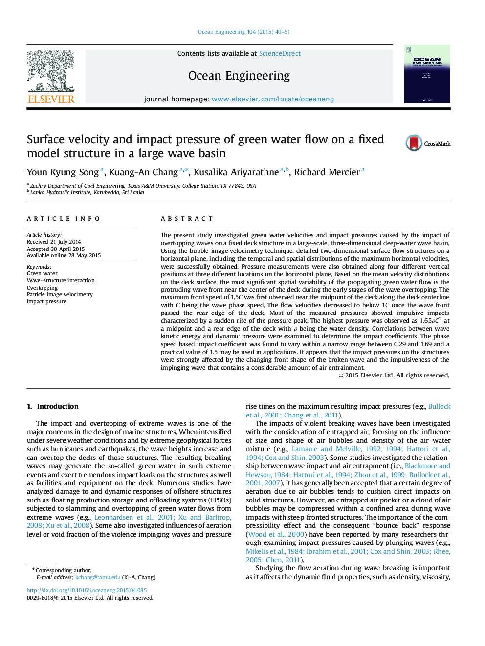 Surface velocity and impact pressure of green water flow on a fixed model structure in a large wave basin