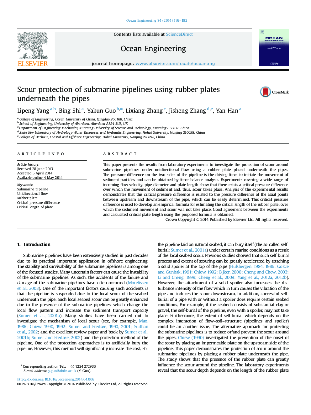 Scour protection of submarine pipelines using rubber plates underneath the pipes