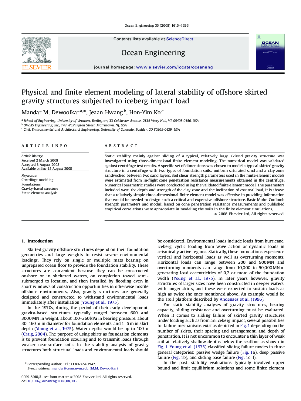 Physical and finite element modeling of lateral stability of offshore skirted gravity structures subjected to iceberg impact load