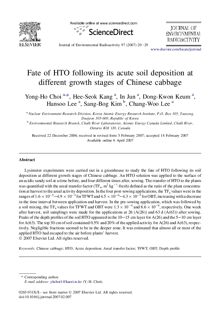 Fate of HTO following its acute soil deposition at different growth stages of Chinese cabbage