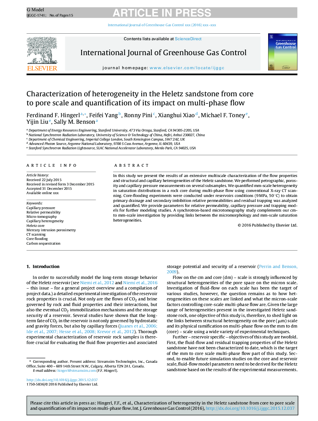 Characterization of heterogeneity in the Heletz sandstone from core to pore scale and quantification of its impact on multi-phase flow