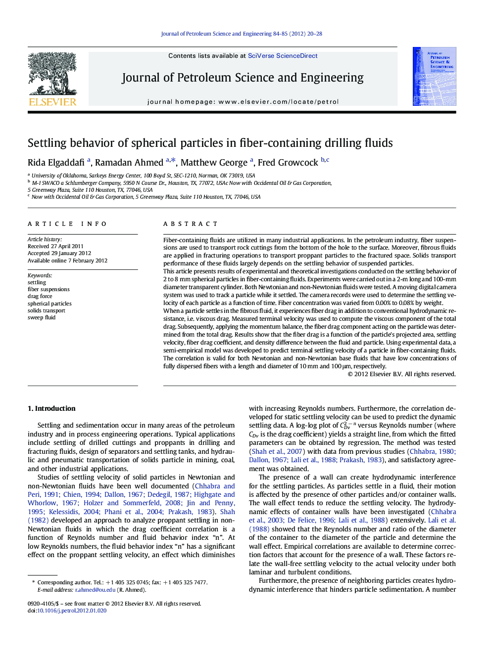 Settling behavior of spherical particles in fiber-containing drilling fluids