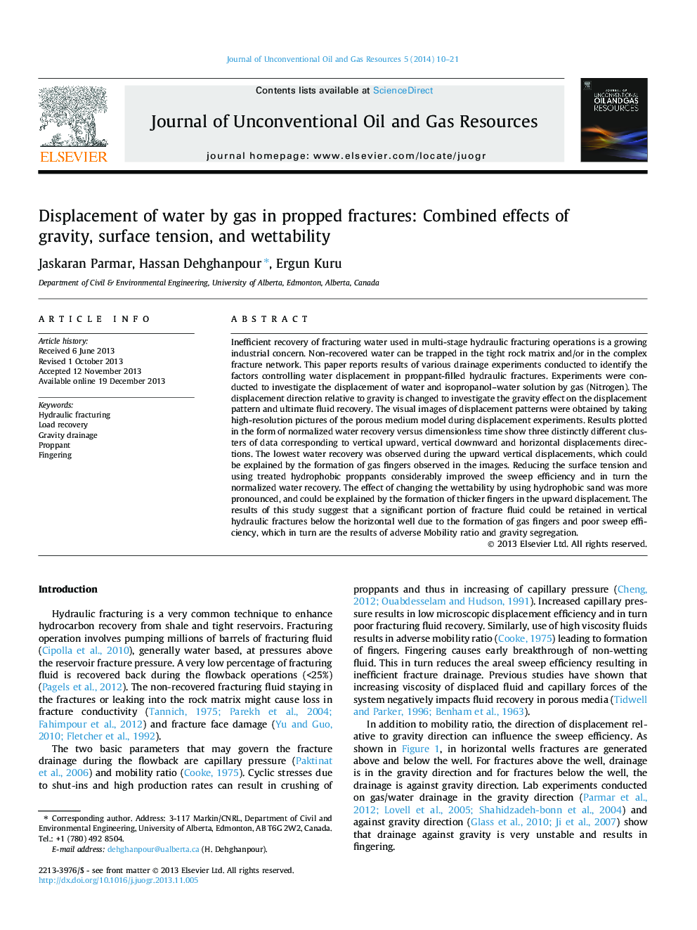 Displacement of water by gas in propped fractures: Combined effects of gravity, surface tension, and wettability