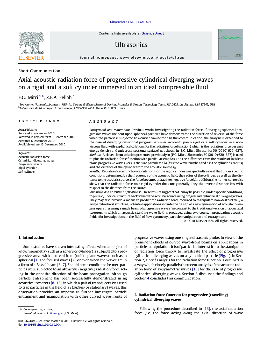 Axial acoustic radiation force of progressive cylindrical diverging waves on a rigid and a soft cylinder immersed in an ideal compressible fluid