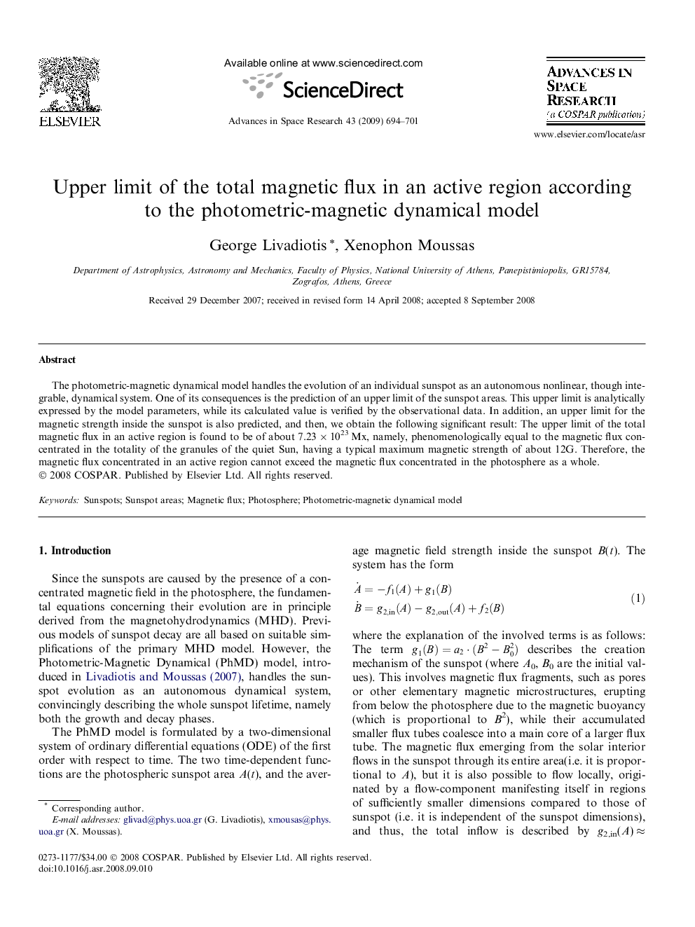 Upper limit of the total magnetic flux in an active region according to the photometric-magnetic dynamical model