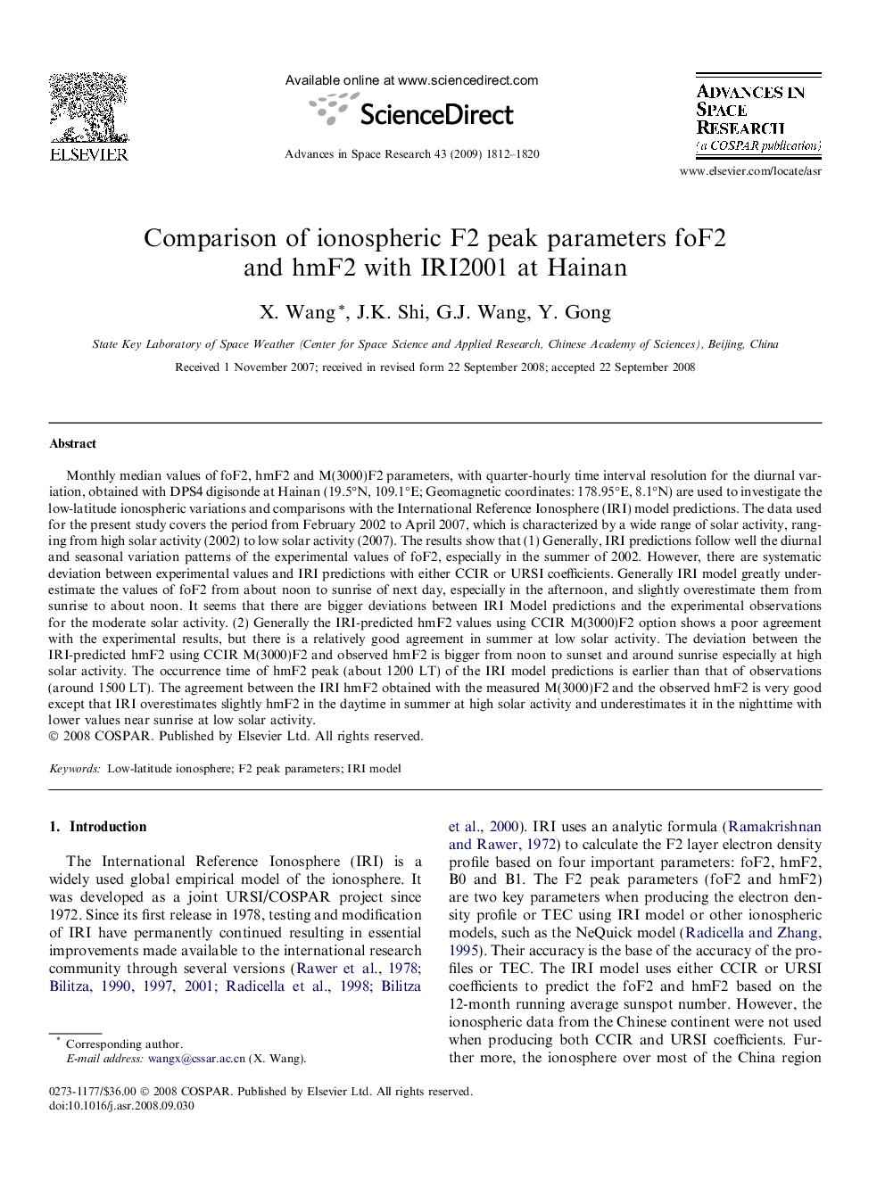 Comparison of ionospheric F2 peak parameters foF2 and hmF2 with IRI2001 at Hainan