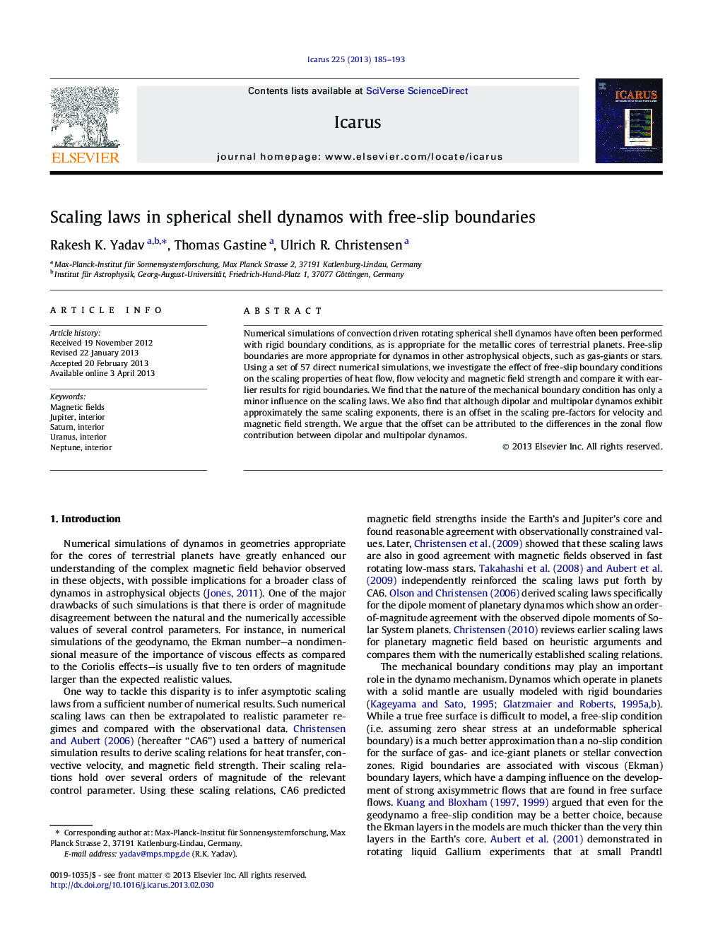 Scaling laws in spherical shell dynamos with free-slip boundaries