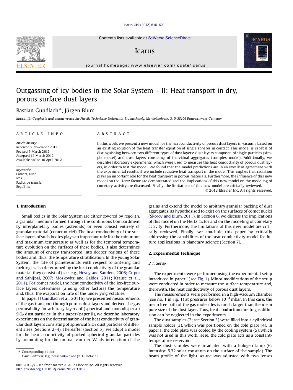 Outgassing of icy bodies in the Solar System – II: Heat transport in dry, porous surface dust layers