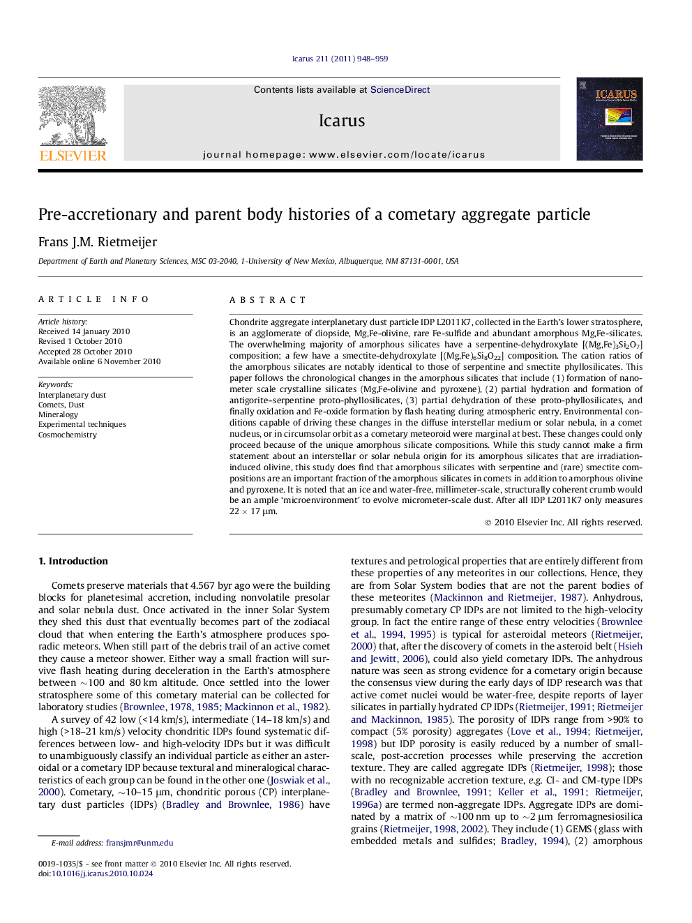 Pre-accretionary and parent body histories of a cometary aggregate particle