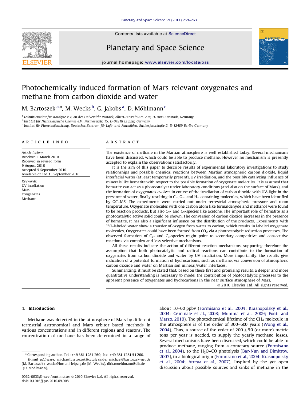 Photochemically induced formation of Mars relevant oxygenates and methane from carbon dioxide and water