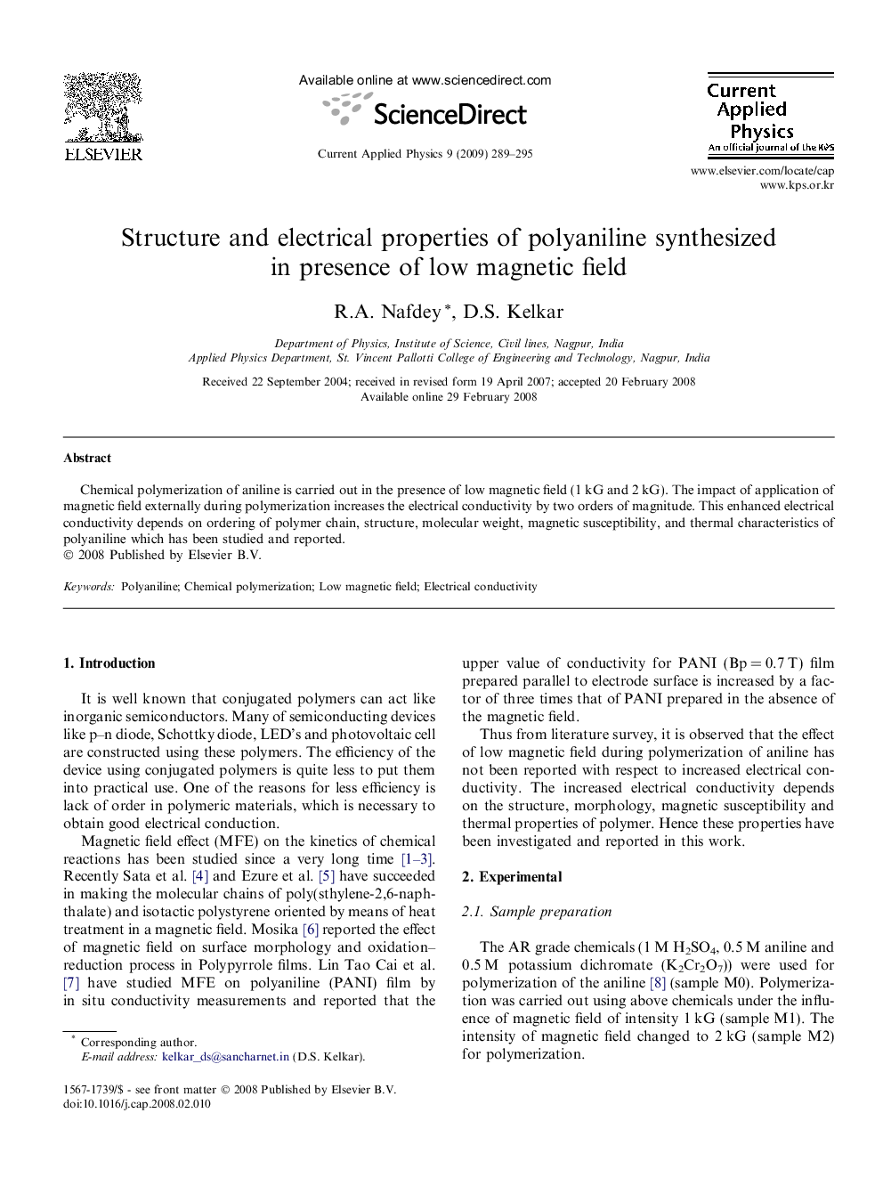 Structure and electrical properties of polyaniline synthesized in presence of low magnetic field