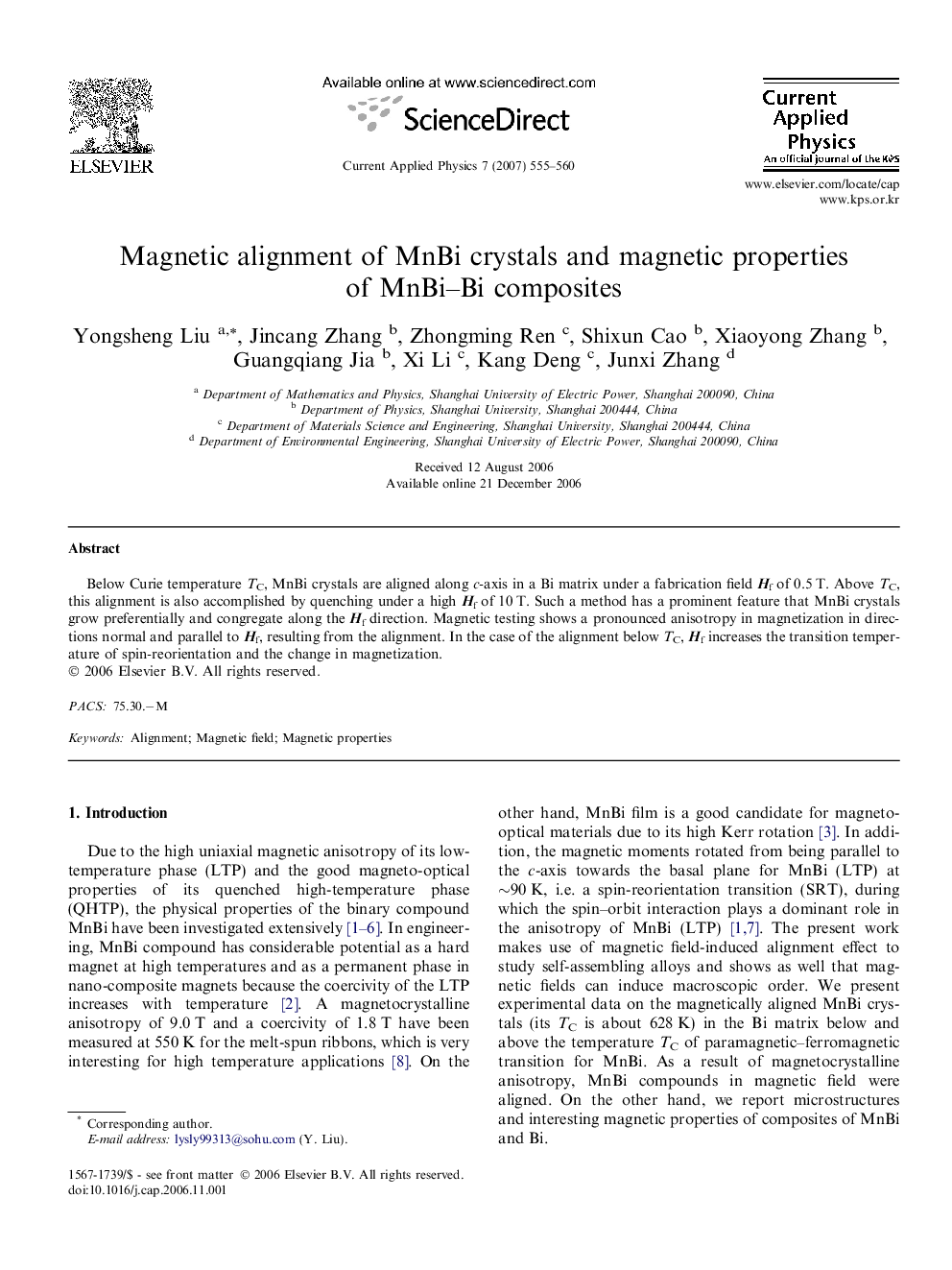 Magnetic alignment of MnBi crystals and magnetic properties of MnBi-Bi composites