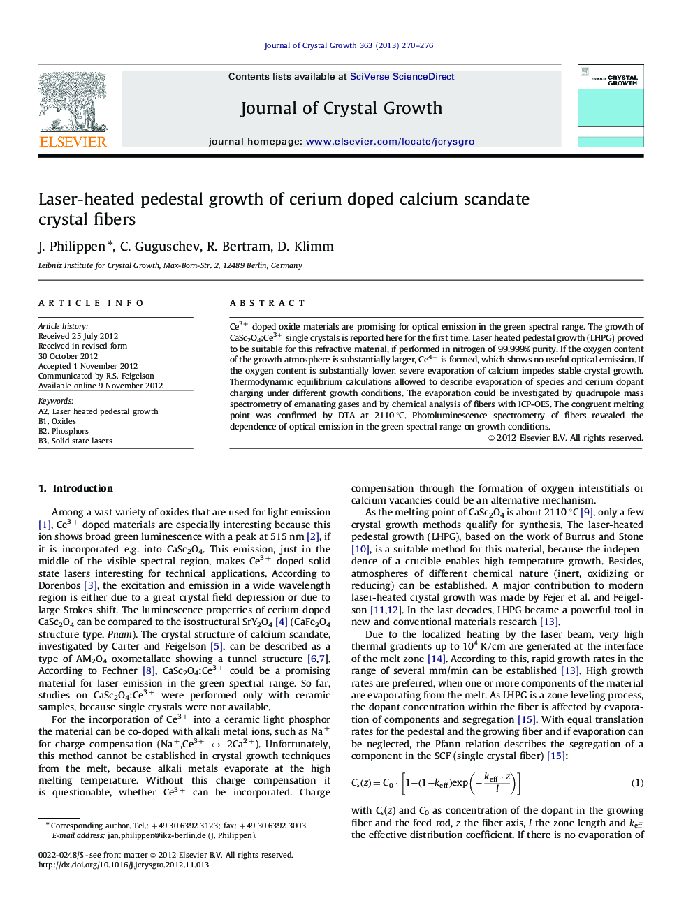 Laser-heated pedestal growth of cerium doped calcium scandate crystal fibers