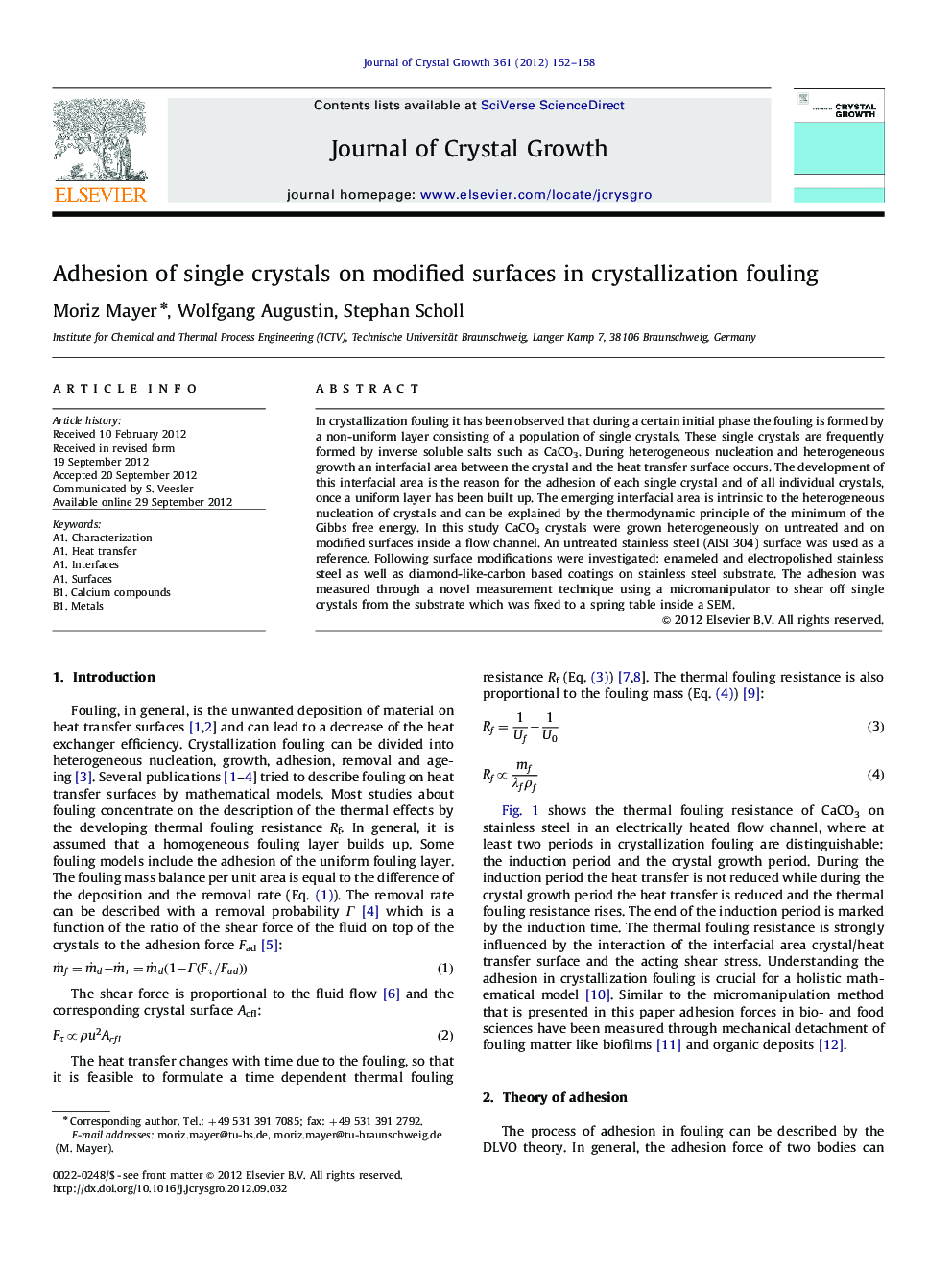 Adhesion of single crystals on modified surfaces in crystallization fouling