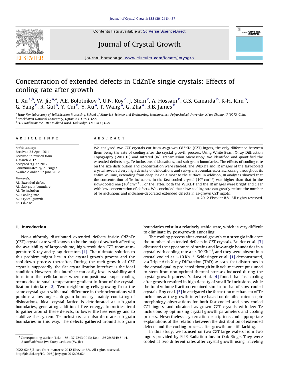 Concentration of extended defects in CdZnTe single crystals: Effects of cooling rate after growth