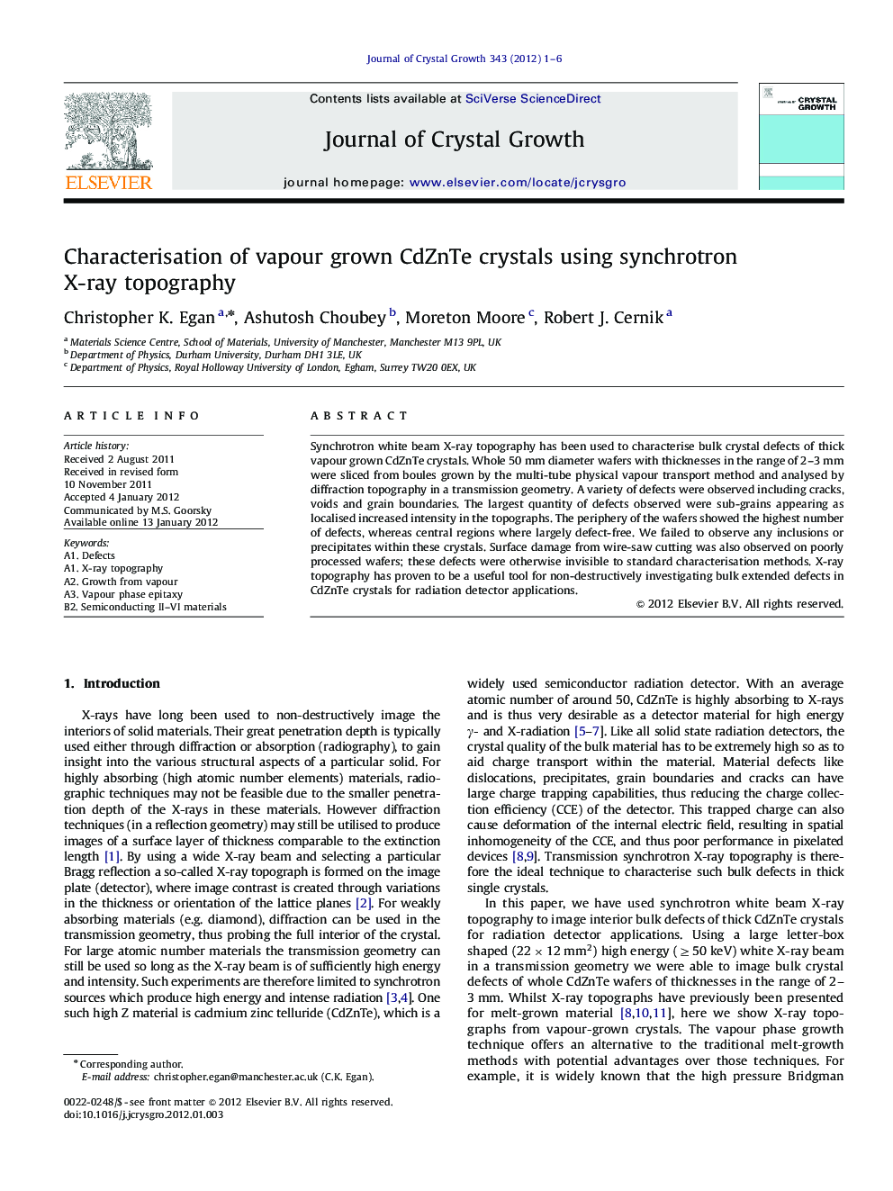 Characterisation of vapour grown CdZnTe crystals using synchrotron X-ray topography