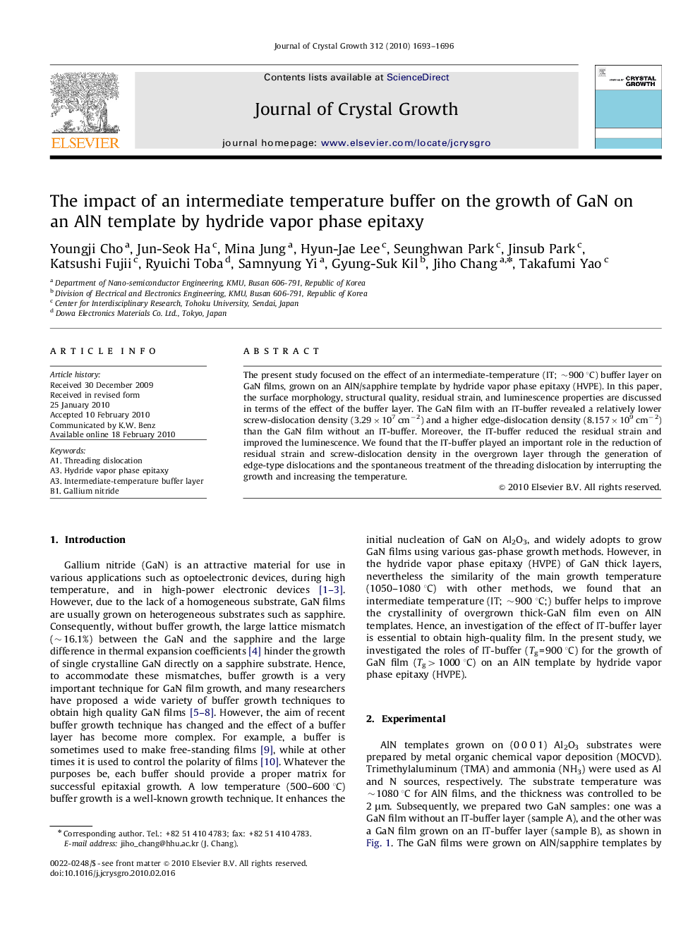 The impact of an intermediate temperature buffer on the growth of GaN on an AlN template by hydride vapor phase epitaxy