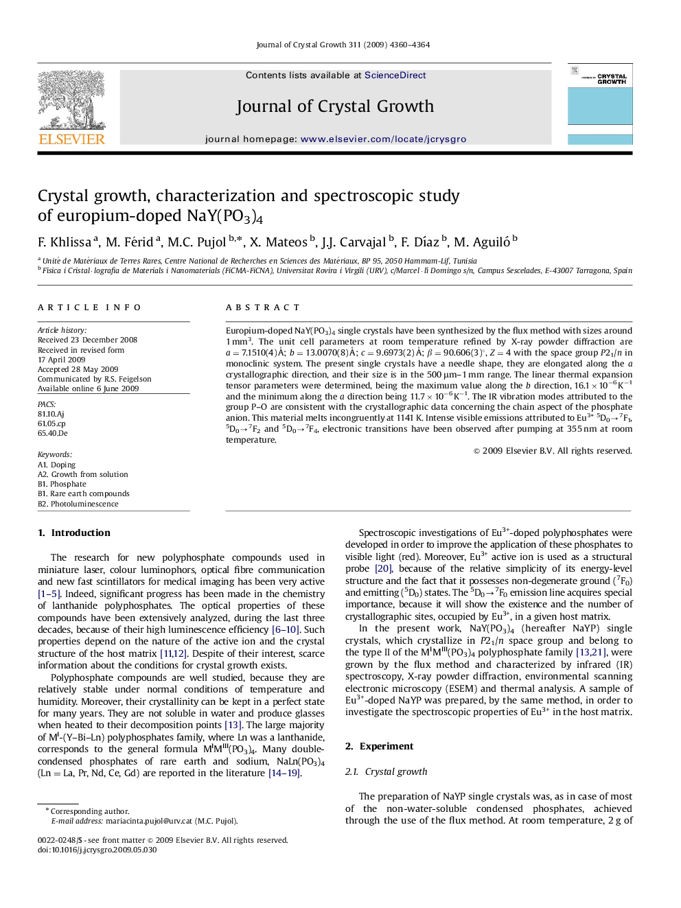 Crystal growth, characterization and spectroscopic study of europium-doped NaY(PO3)4