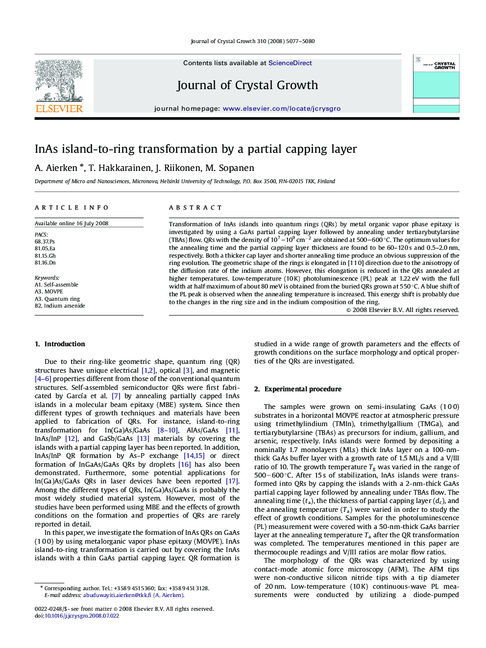 InAs island-to-ring transformation by a partial capping layer