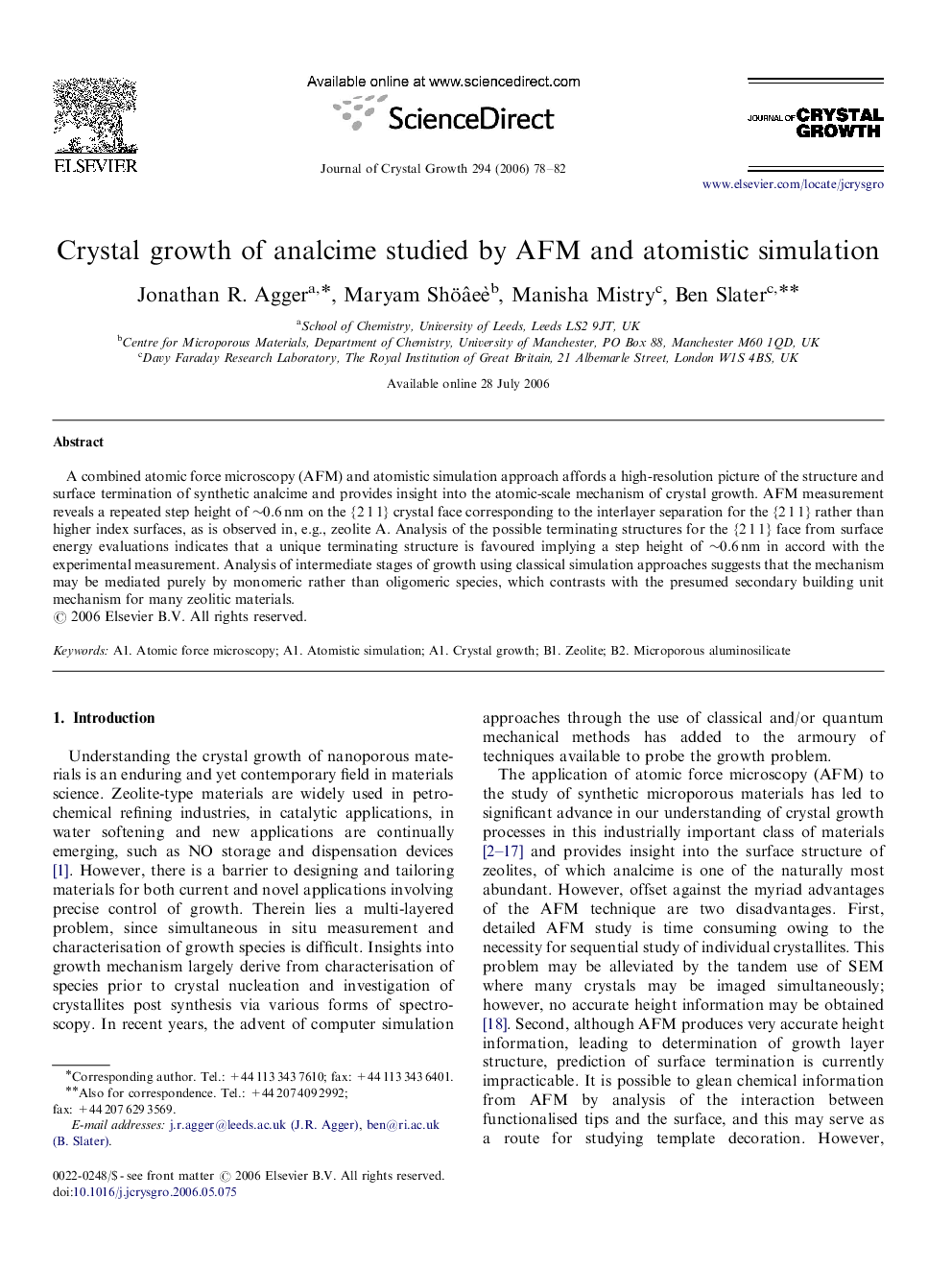 Crystal growth of analcime studied by AFM and atomistic simulation