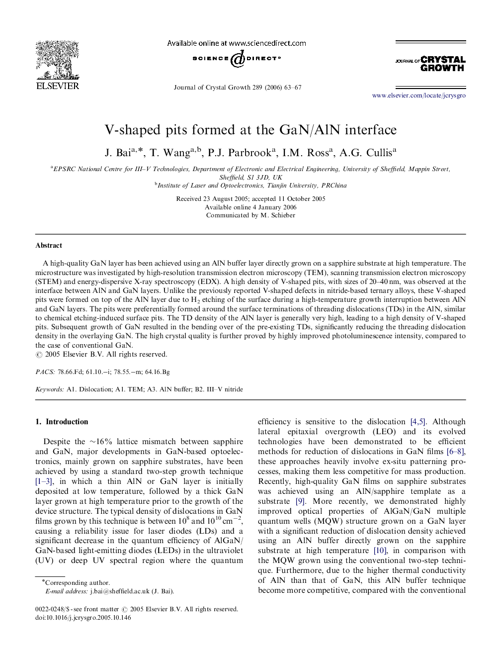V-shaped pits formed at the GaN/AlN interface