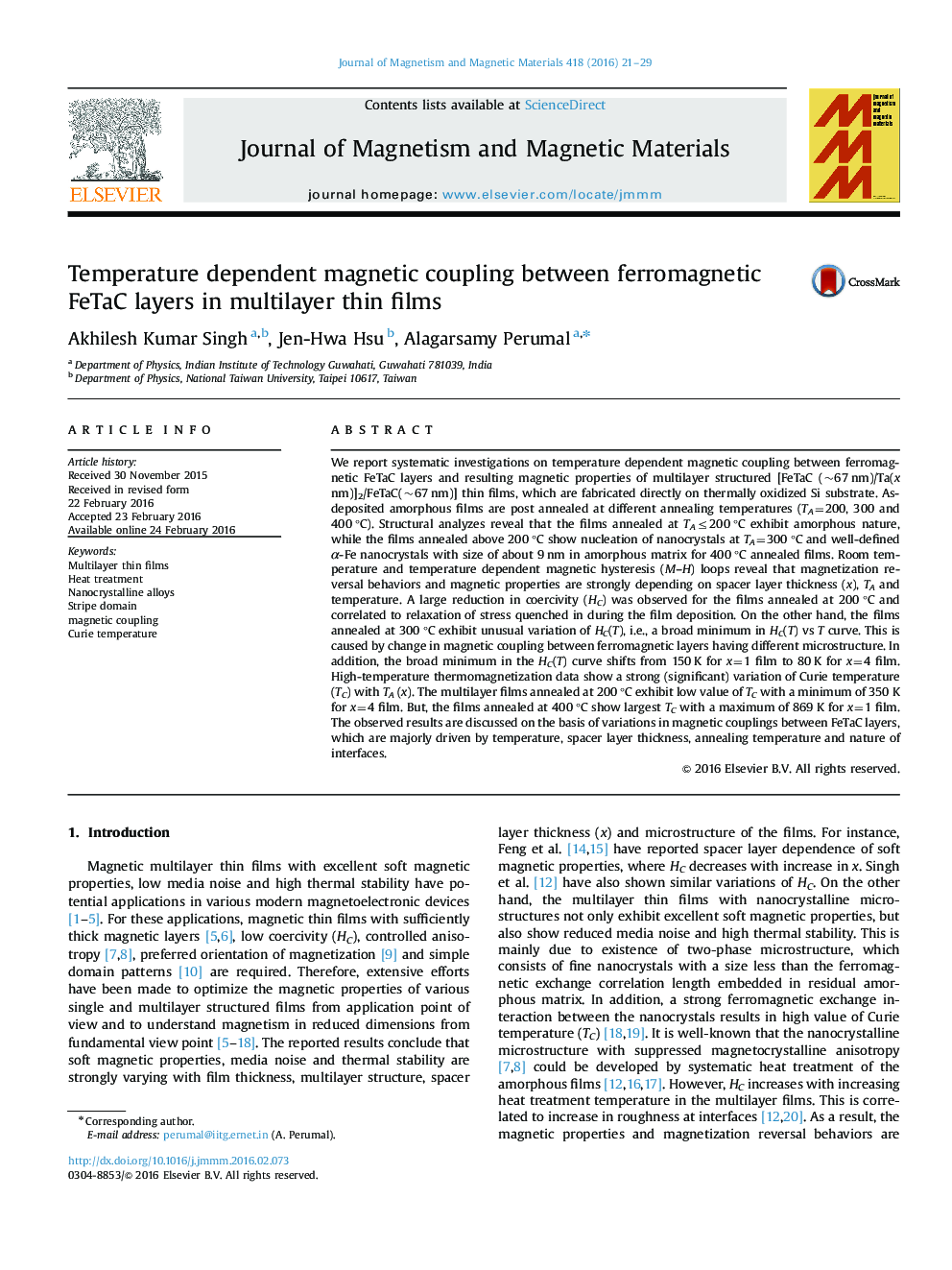 Temperature dependent magnetic coupling between ferromagnetic FeTaC layers in multilayer thin films