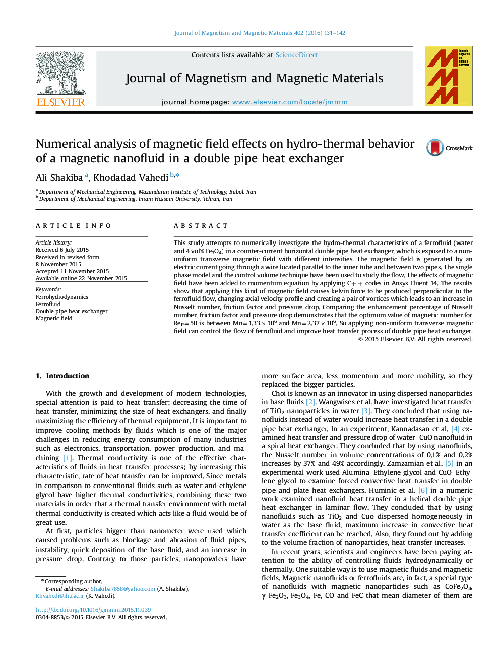 Numerical analysis of magnetic field effects on hydro-thermal behavior of a magnetic nanofluid in a double pipe heat exchanger