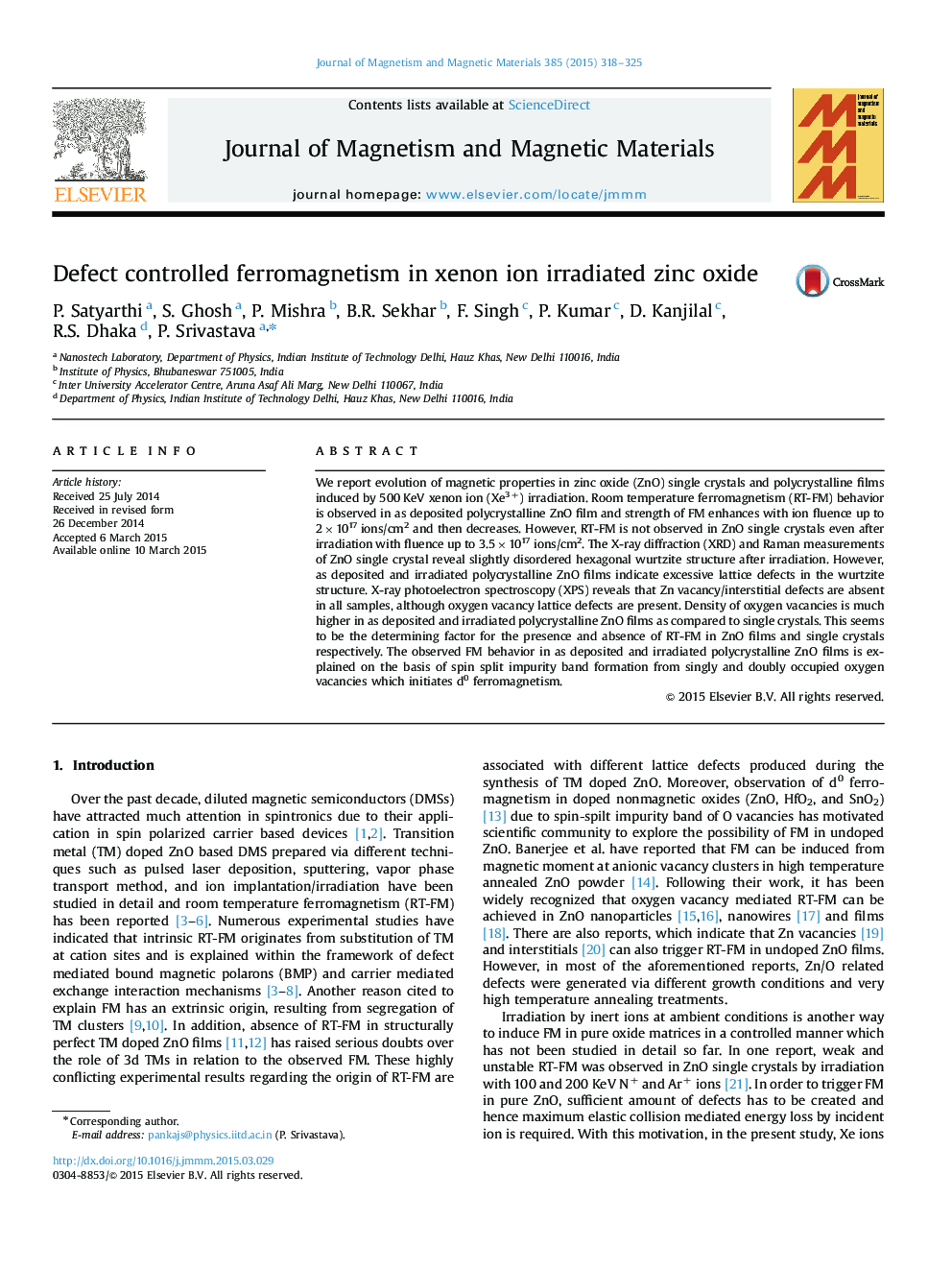 Defect controlled ferromagnetism in xenon ion irradiated zinc oxide