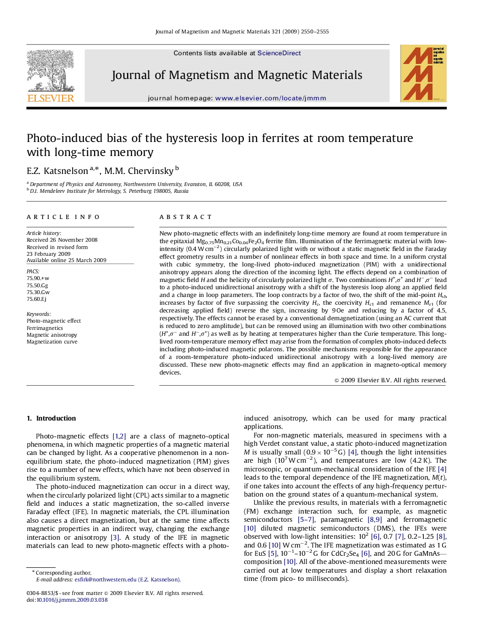 Photo-induced bias of the hysteresis loop in ferrites at room temperature with long-time memory