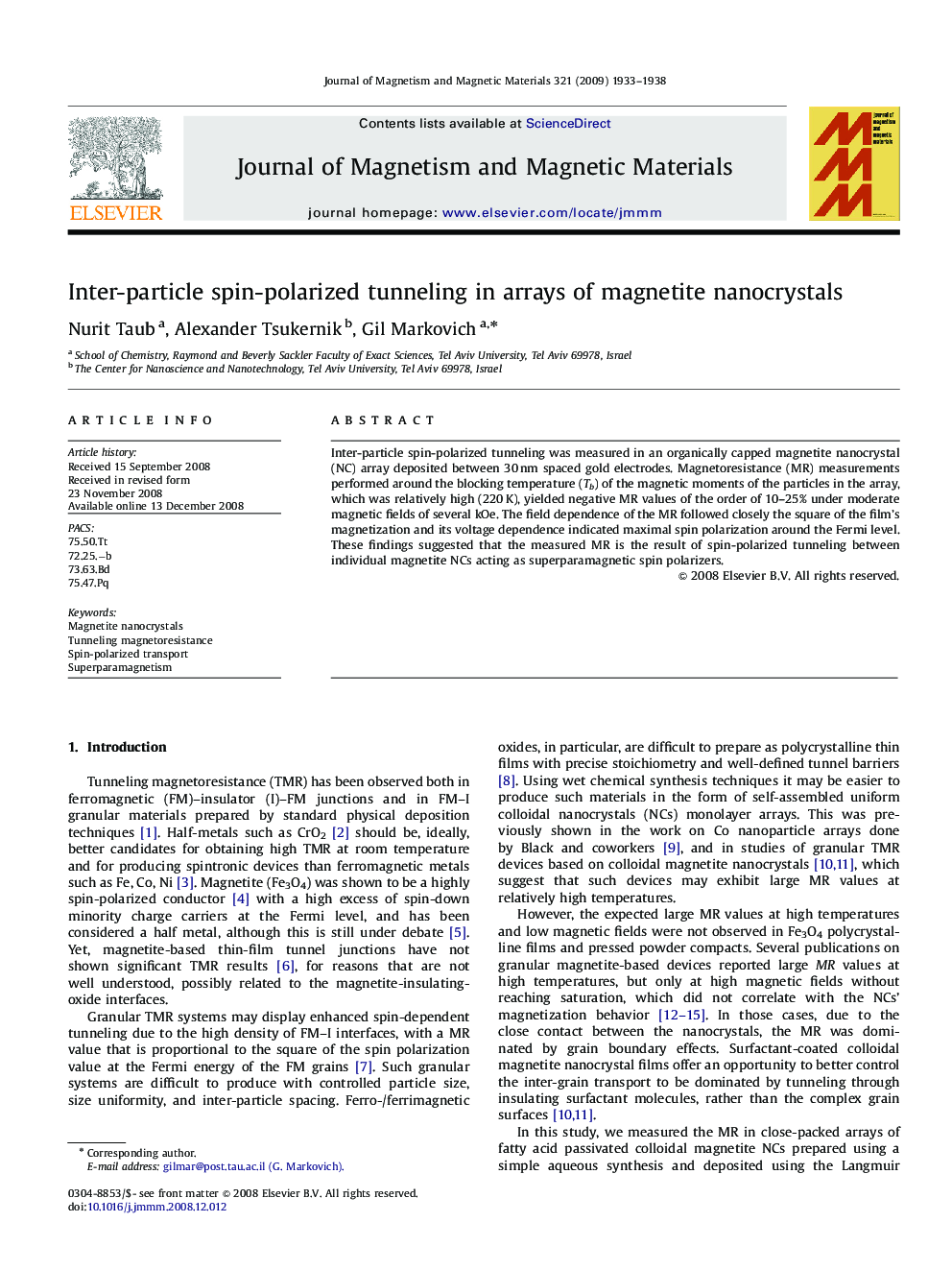 Inter-particle spin-polarized tunneling in arrays of magnetite nanocrystals