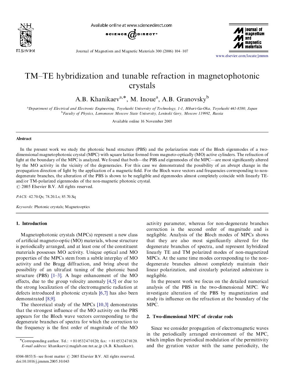 TM–TE hybridization and tunable refraction in magnetophotonic crystals