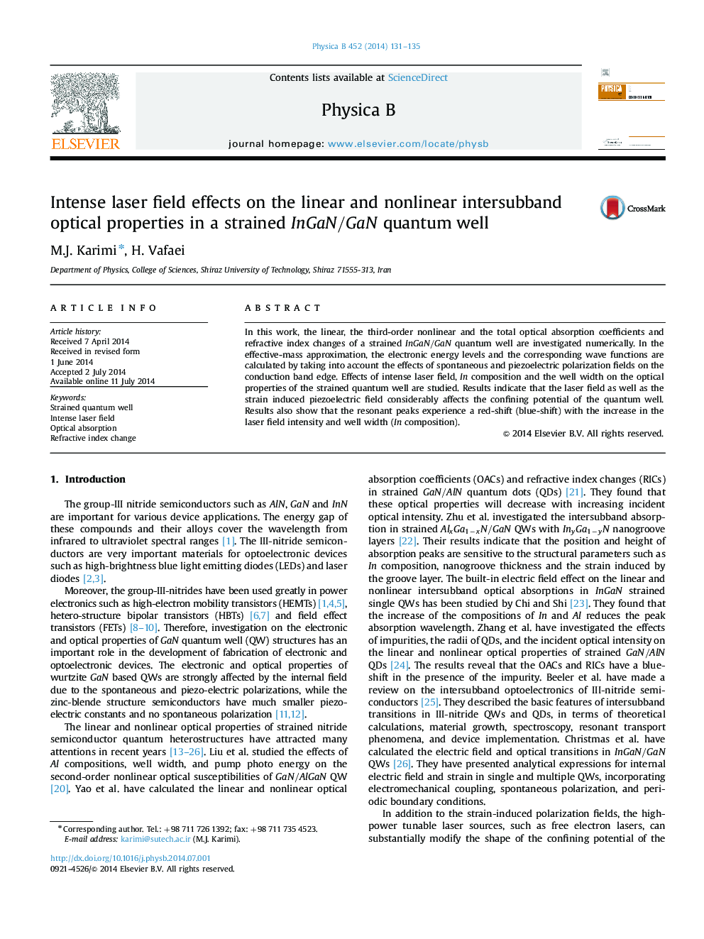 Intense laser field effects on the linear and nonlinear intersubband optical properties in a strained InGaN/GaNInGaN/GaN quantum well