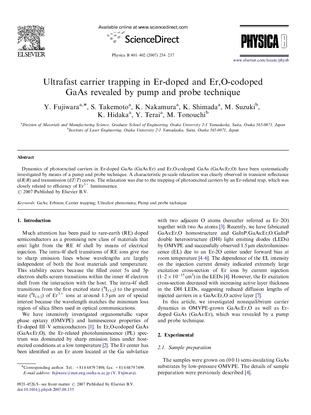 Ultrafast carrier trapping in Er-doped and Er,O-codoped GaAs revealed by pump and probe technique