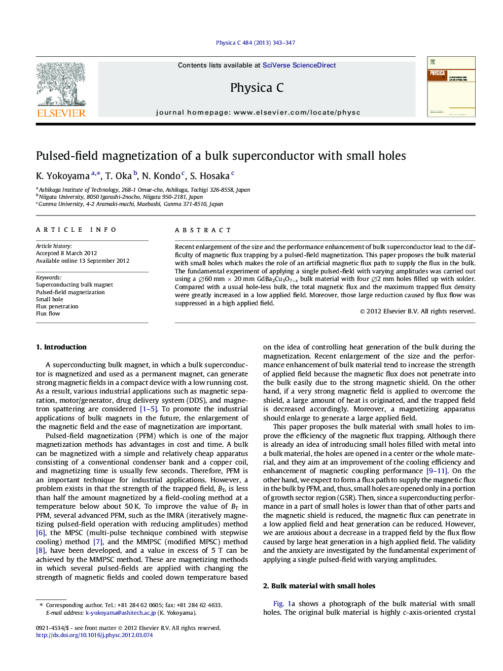 Pulsed-field magnetization of a bulk superconductor with small holes