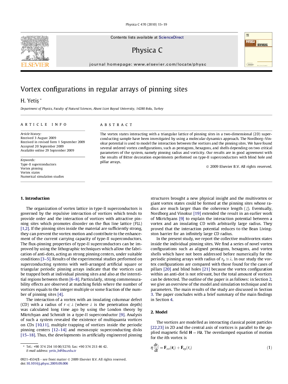 Vortex configurations in regular arrays of pinning sites