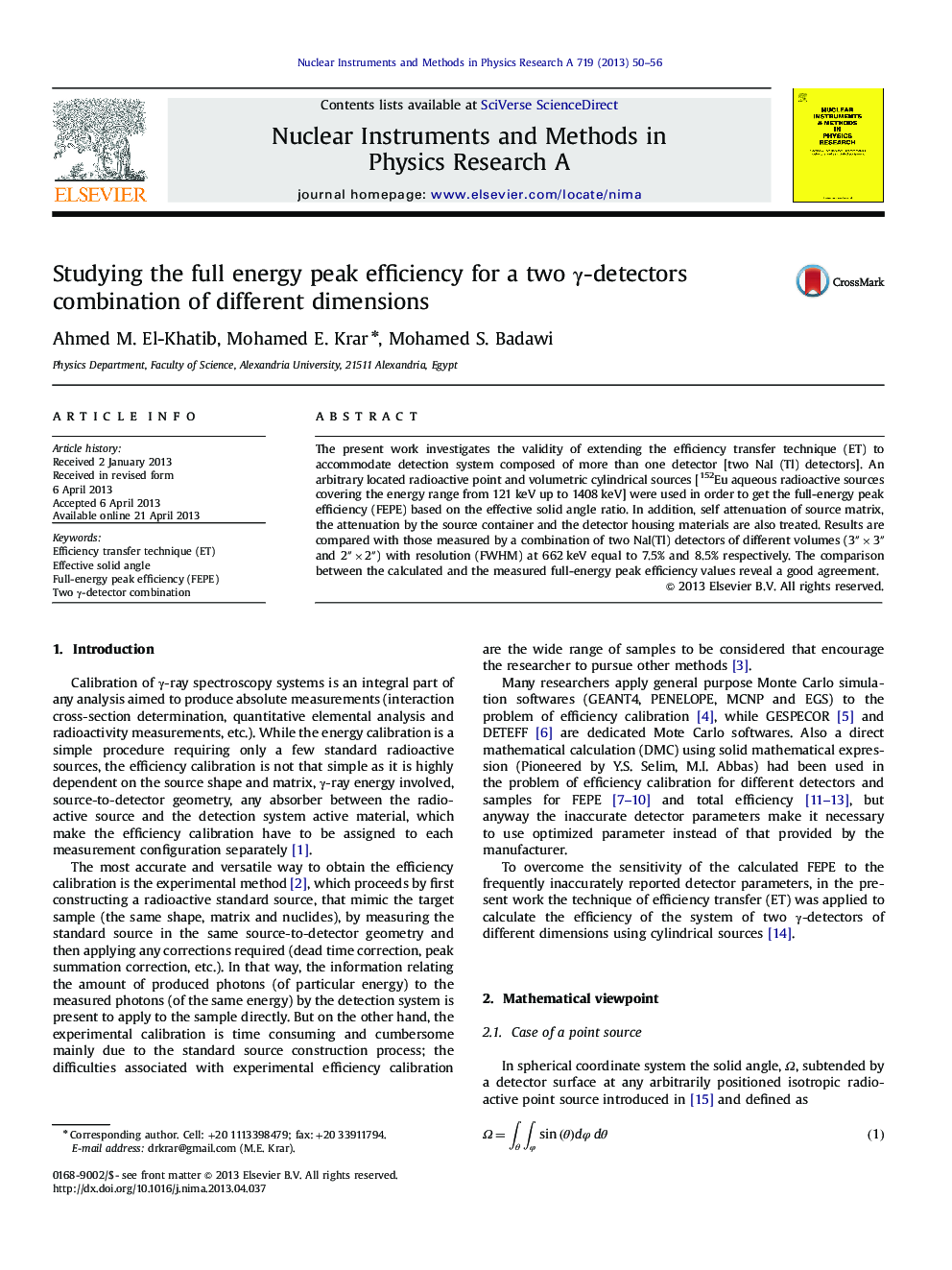 Studying the full energy peak efficiency for a two γ-detectors combination of different dimensions