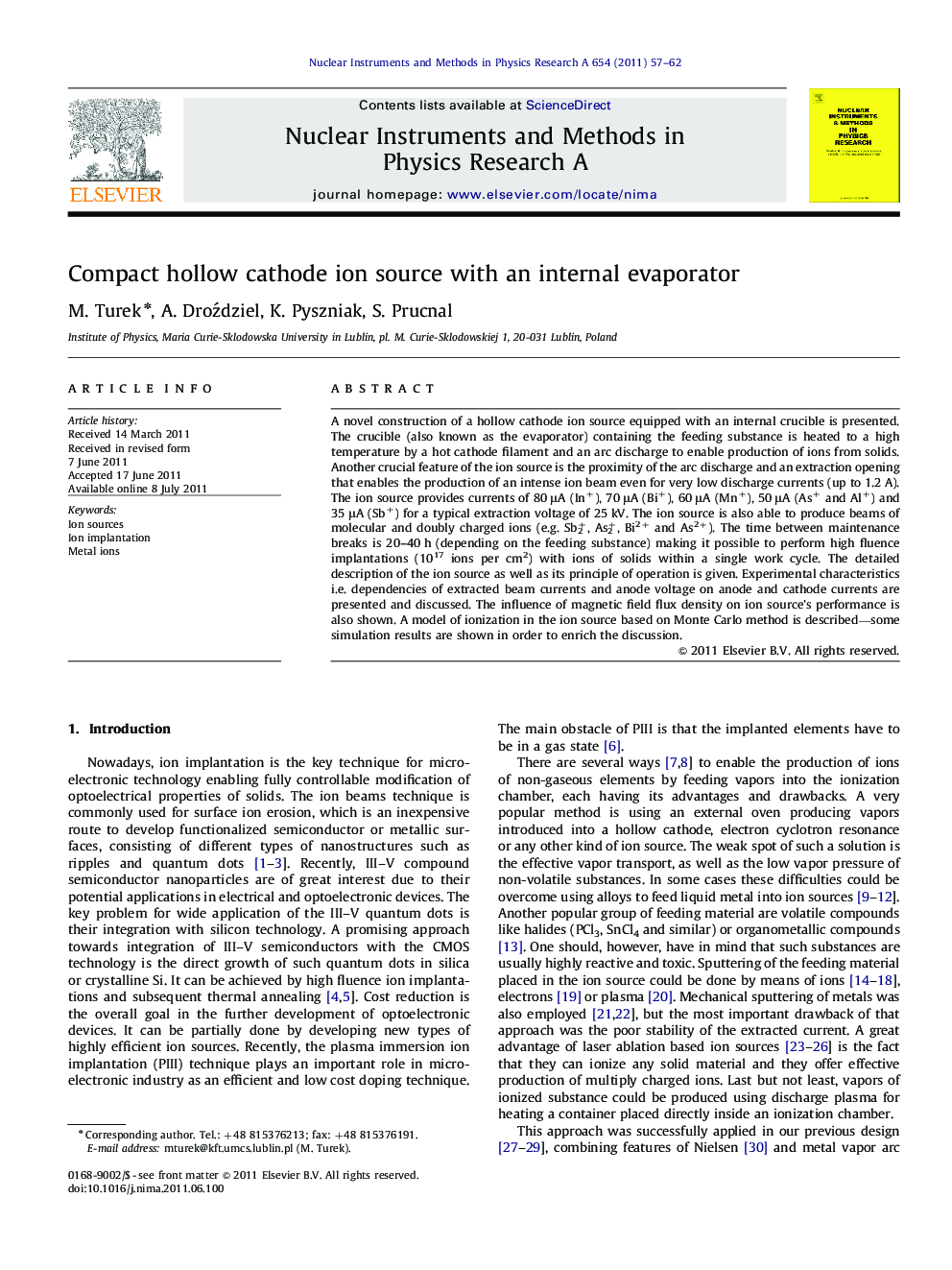 Compact hollow cathode ion source with an internal evaporator