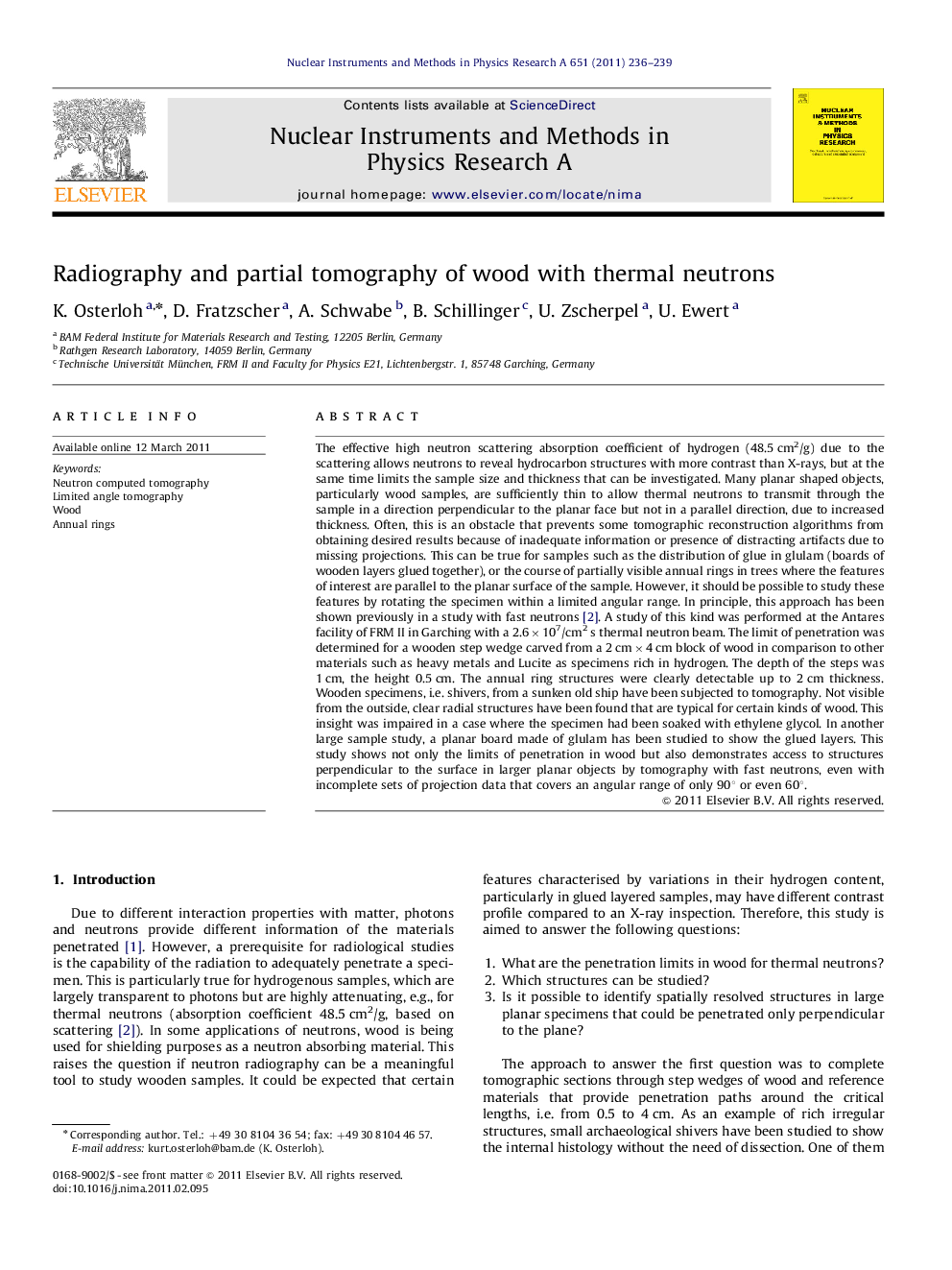 Radiography and partial tomography of wood with thermal neutrons