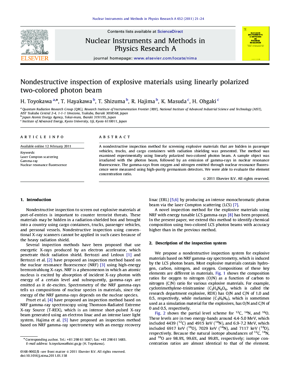 Nondestructive inspection of explosive materials using linearly polarized two-colored photon beam